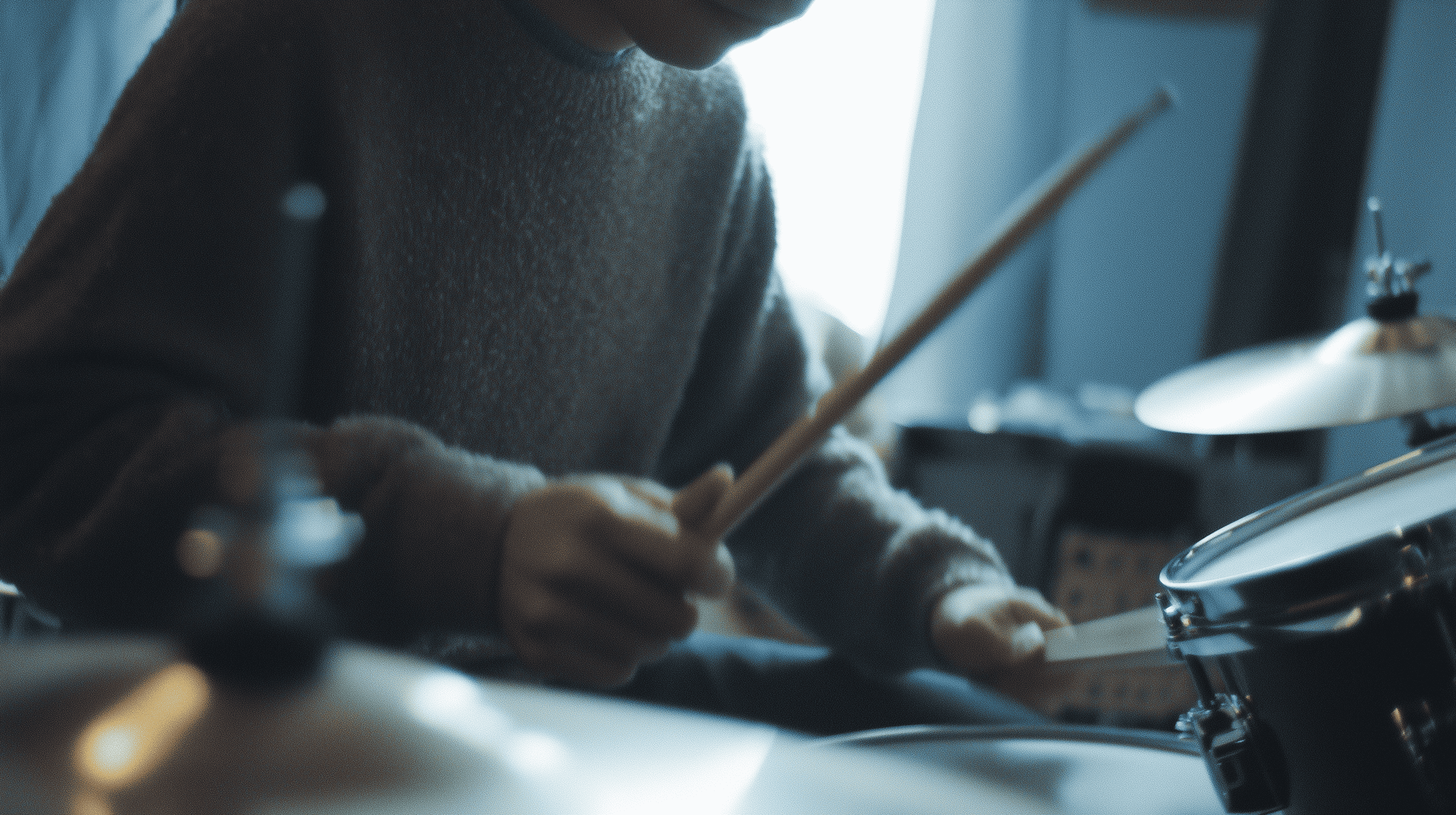 Illustration of a teacher working on a laptop